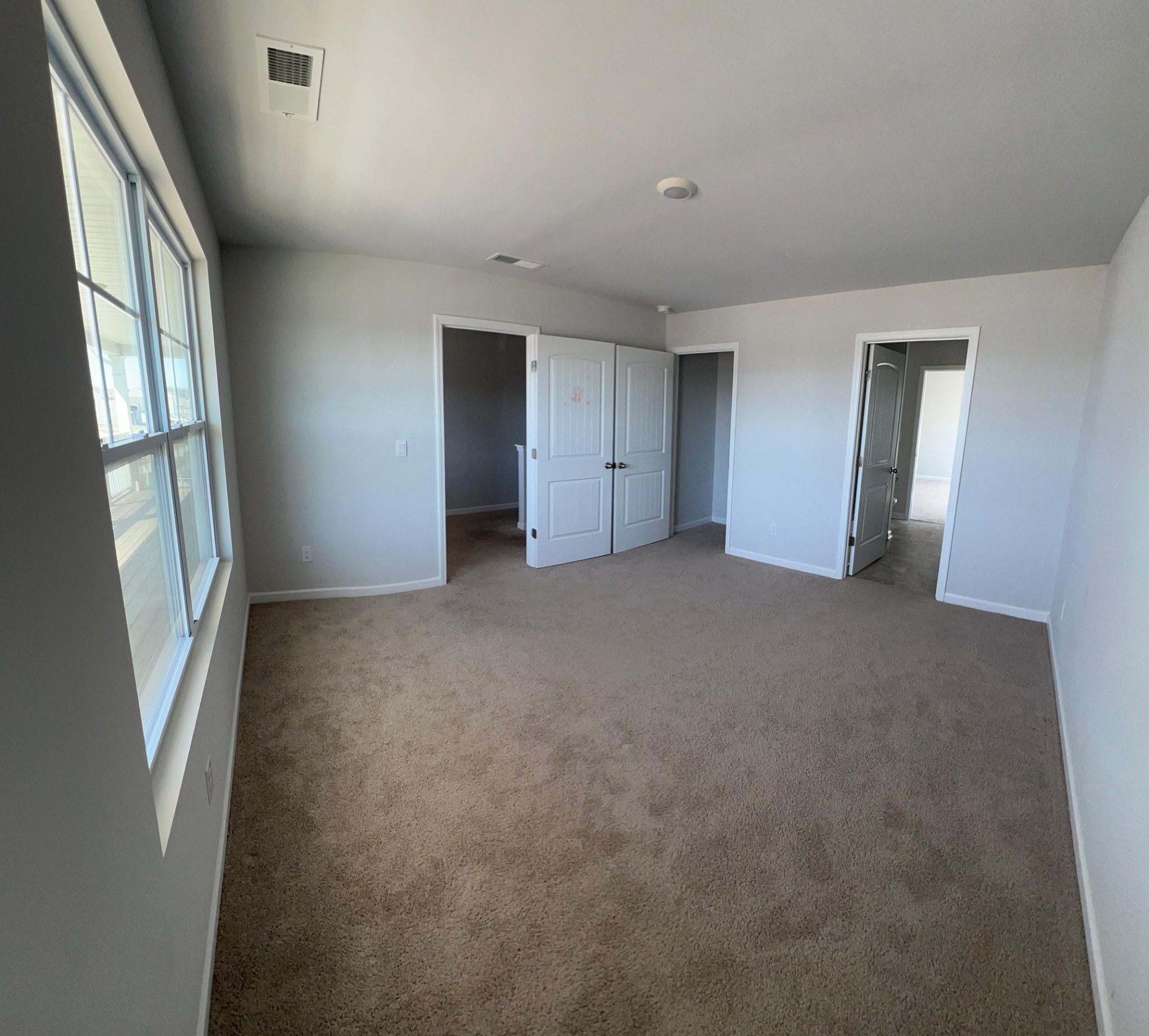 4145 Dolly Way Antioch, TN 37013 - Photo 16 of 24 an empty room with windows and closet