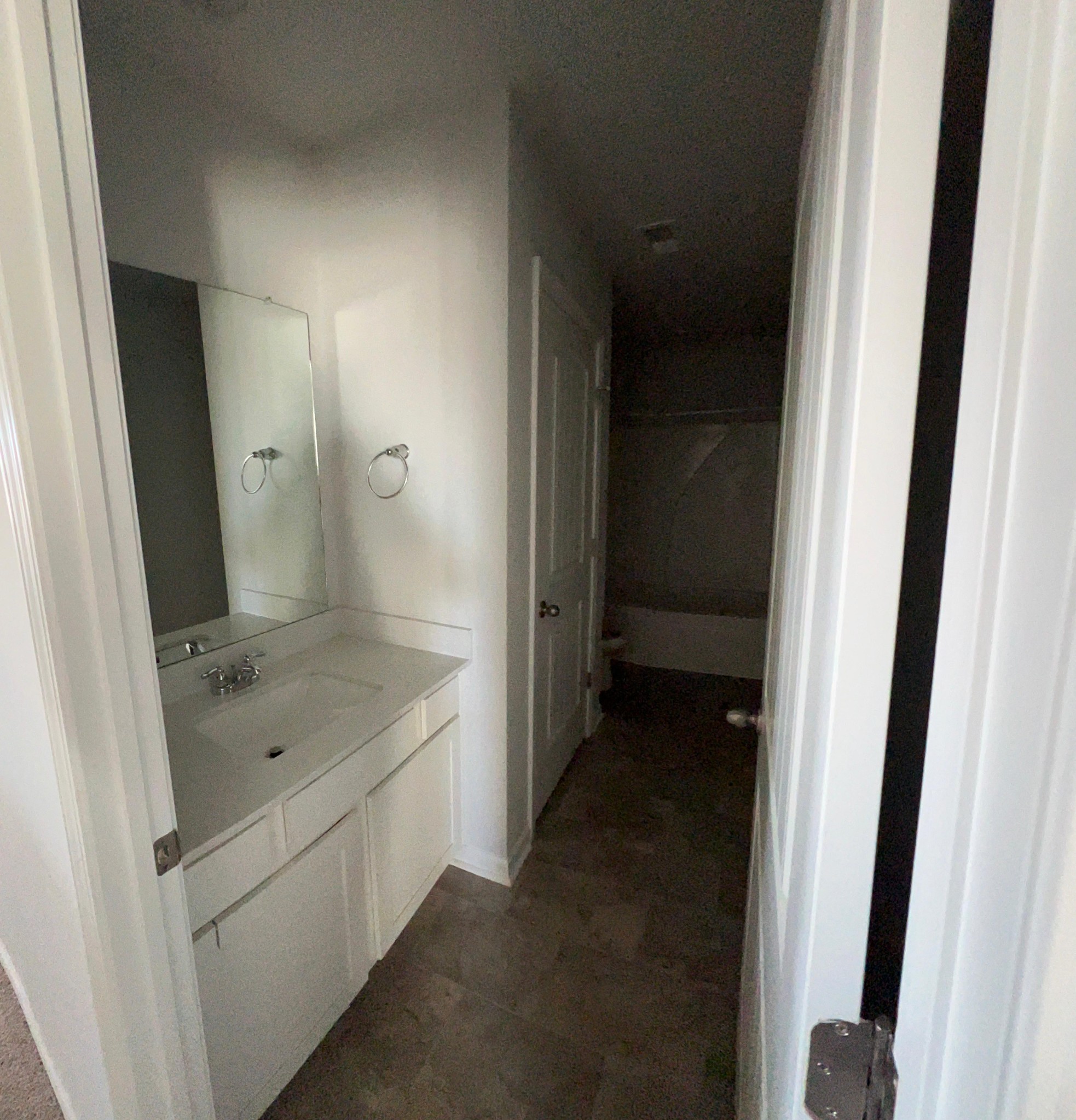 4145 Dolly Way Antioch, TN 37013 - Photo 21 of 24 a bathroom with a granite countertop sink a mirror and a bathtub