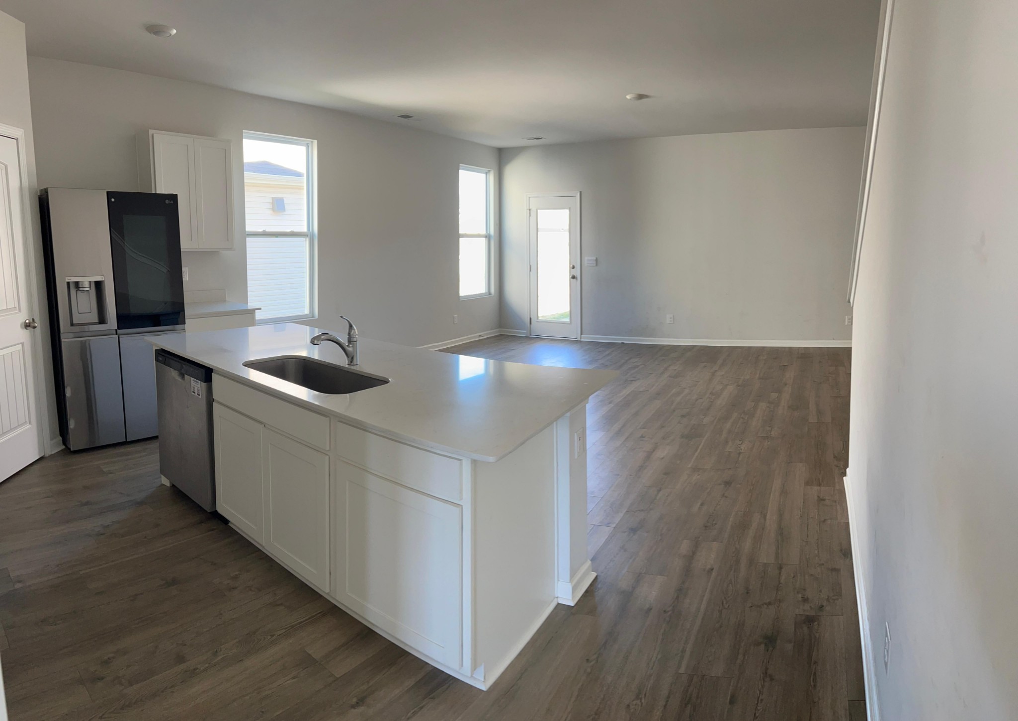 4145 Dolly Way Antioch, TN 37013 - Photo 8 of 24 a kitchen with stainless steel appliances granite countertop a sink and a stove