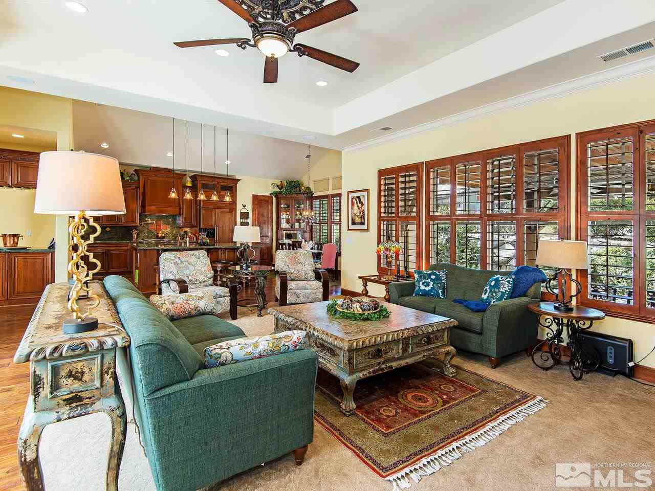 16885 Delacroix Reno, NV 89511 - Photo 14 of 25 a living room with furniture and a large window