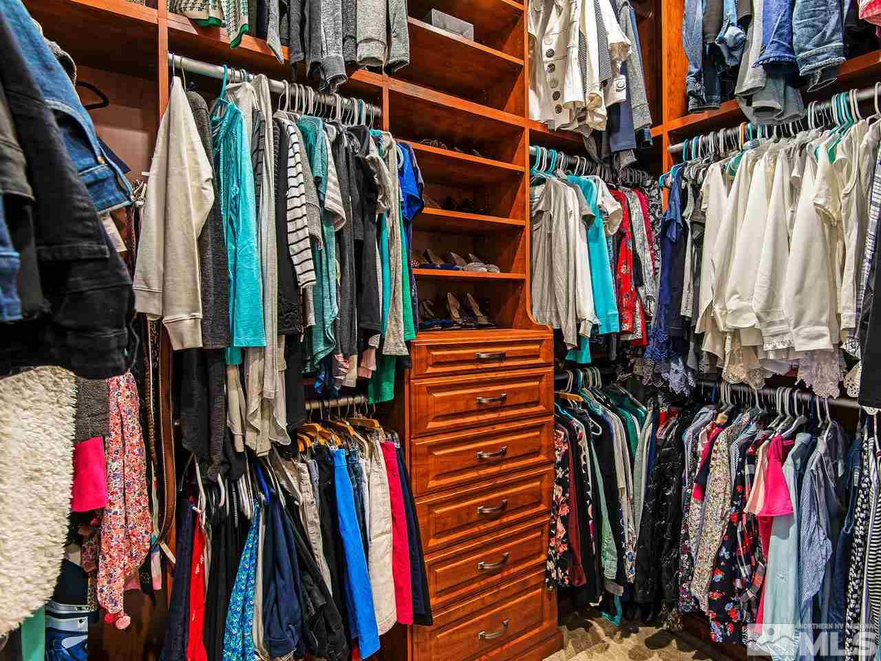 16885 Delacroix Reno, NV 89511 - Photo 18 of 25 a view of walk in closet with clothes