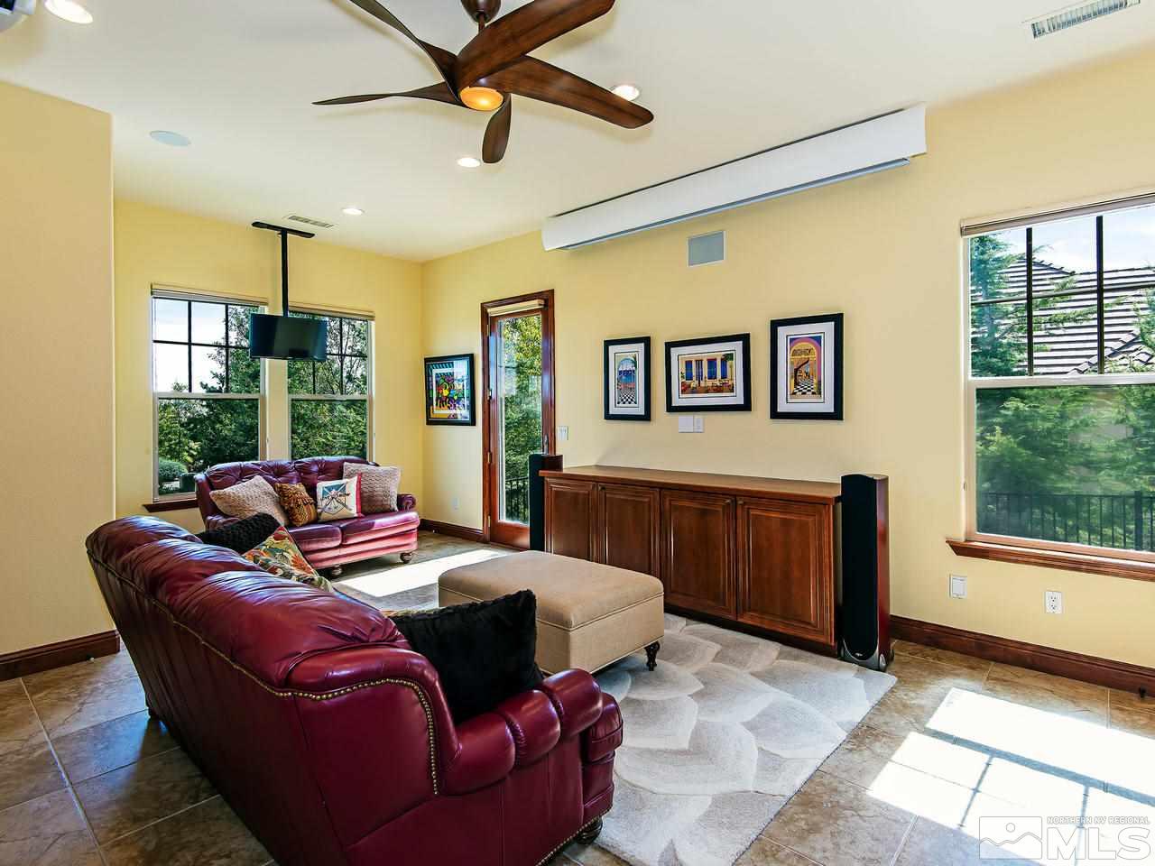 16885 Delacroix Reno, NV 89511 - Photo 19 of 25 a living room with furniture and a window