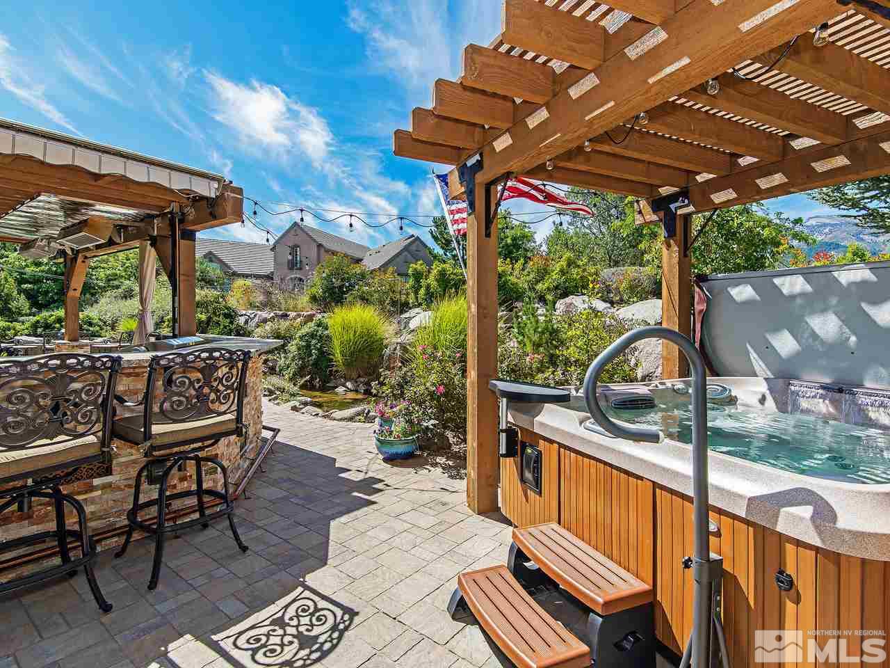16885 Delacroix Reno, NV 89511 - Photo 22 of 25 a view of a chairs and table in the patio