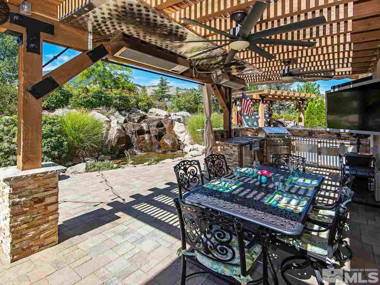 16885 Delacroix Reno, NV 89511 - Photo 23 of 25 a outdoor living space with patio furniture and a potted plant