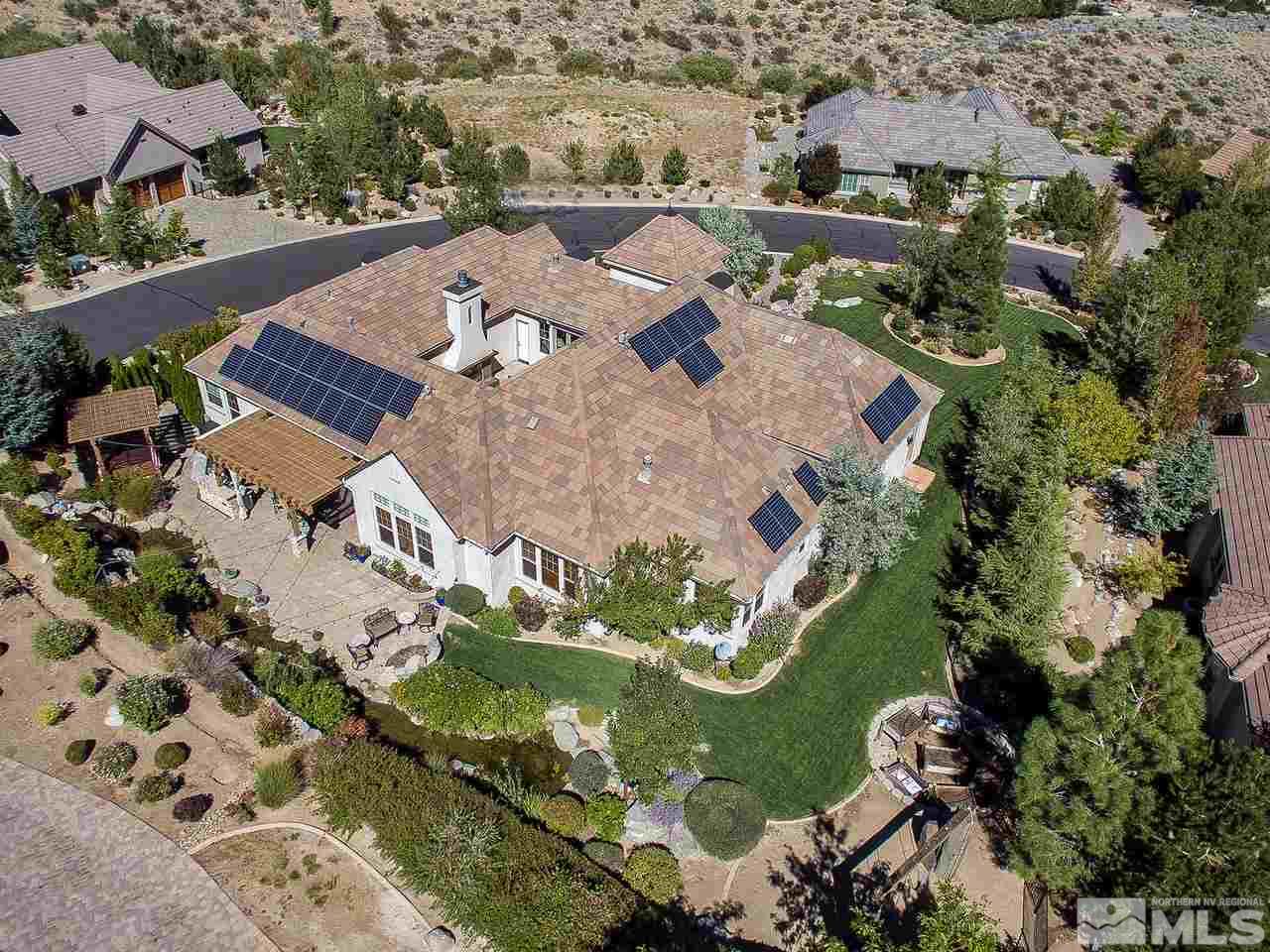 16885 Delacroix Reno, NV 89511 - Photo 24 of 25 an aerial view of residential houses with outdoor space