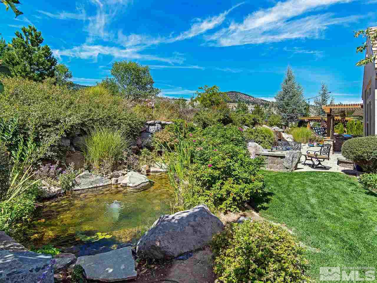 16885 Delacroix Reno, NV 89511 - Photo 25 of 25 a view of a garden with an ocean