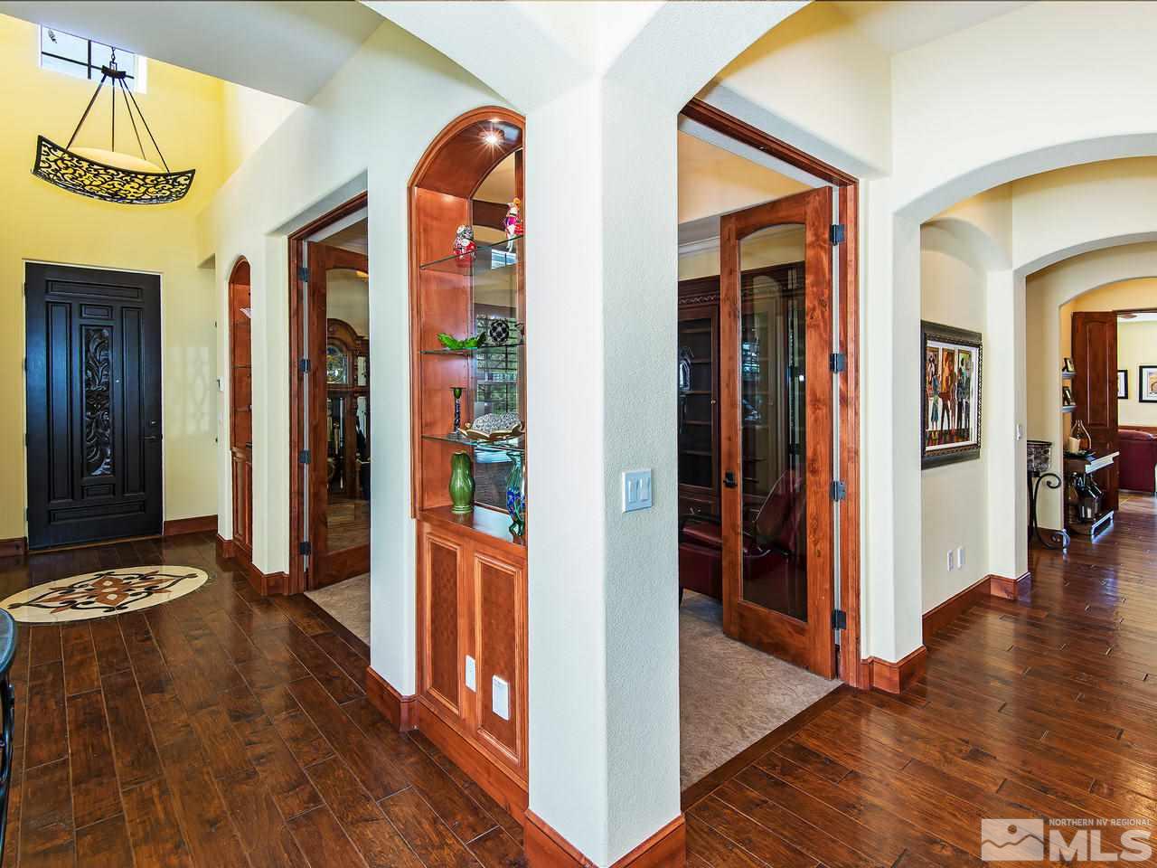 16885 Delacroix Reno, NV 89511 - Photo 4 of 25 a view of an entryway with wooden floor