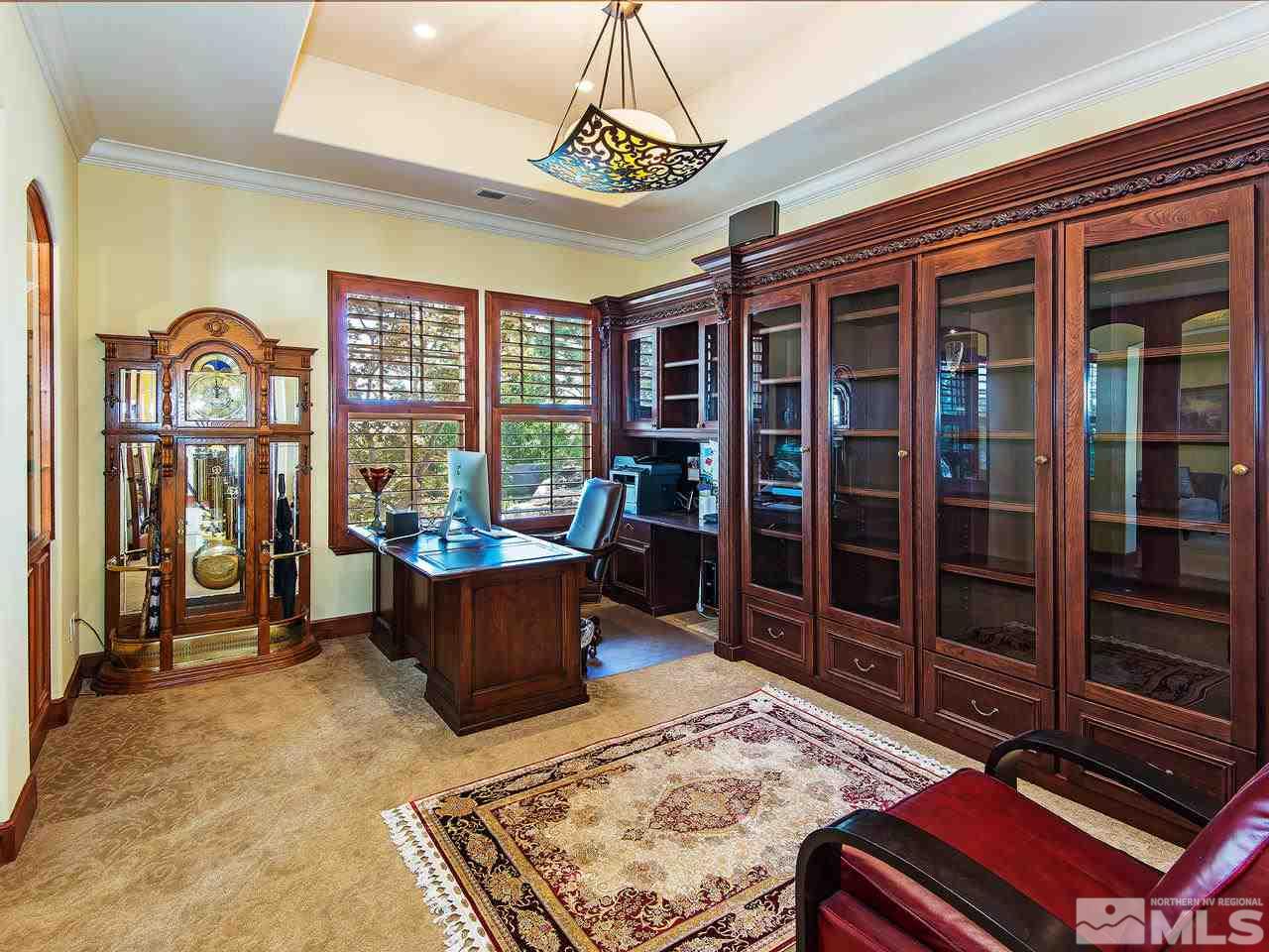 16885 Delacroix Reno, NV 89511 - Photo 6 of 25 a living room with furniture a rug and a window