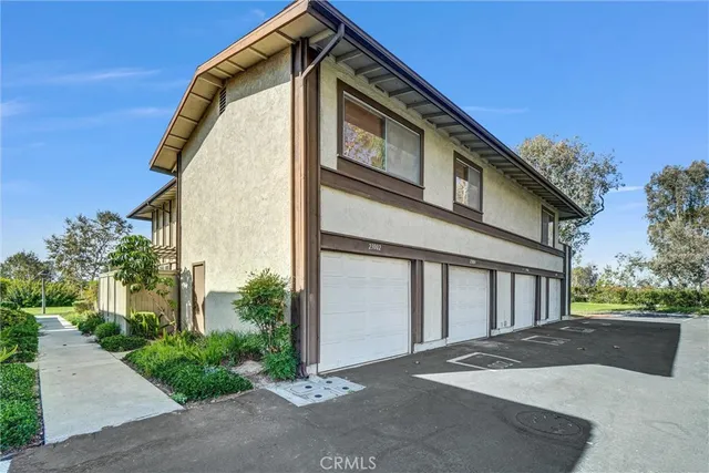 a view of a house with a street
