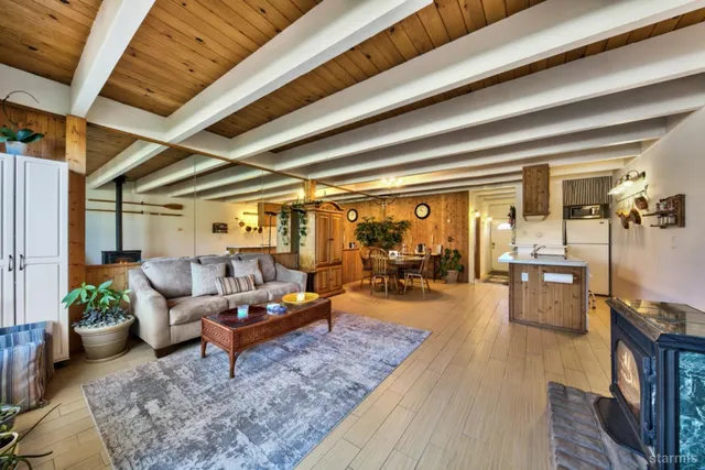 a living room with furniture and a table