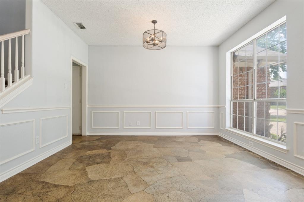 4709 Portrait Lane Plano, TX 75024 - Photo 6 of 22 The dining room flows seamlessly into the Kitchen
