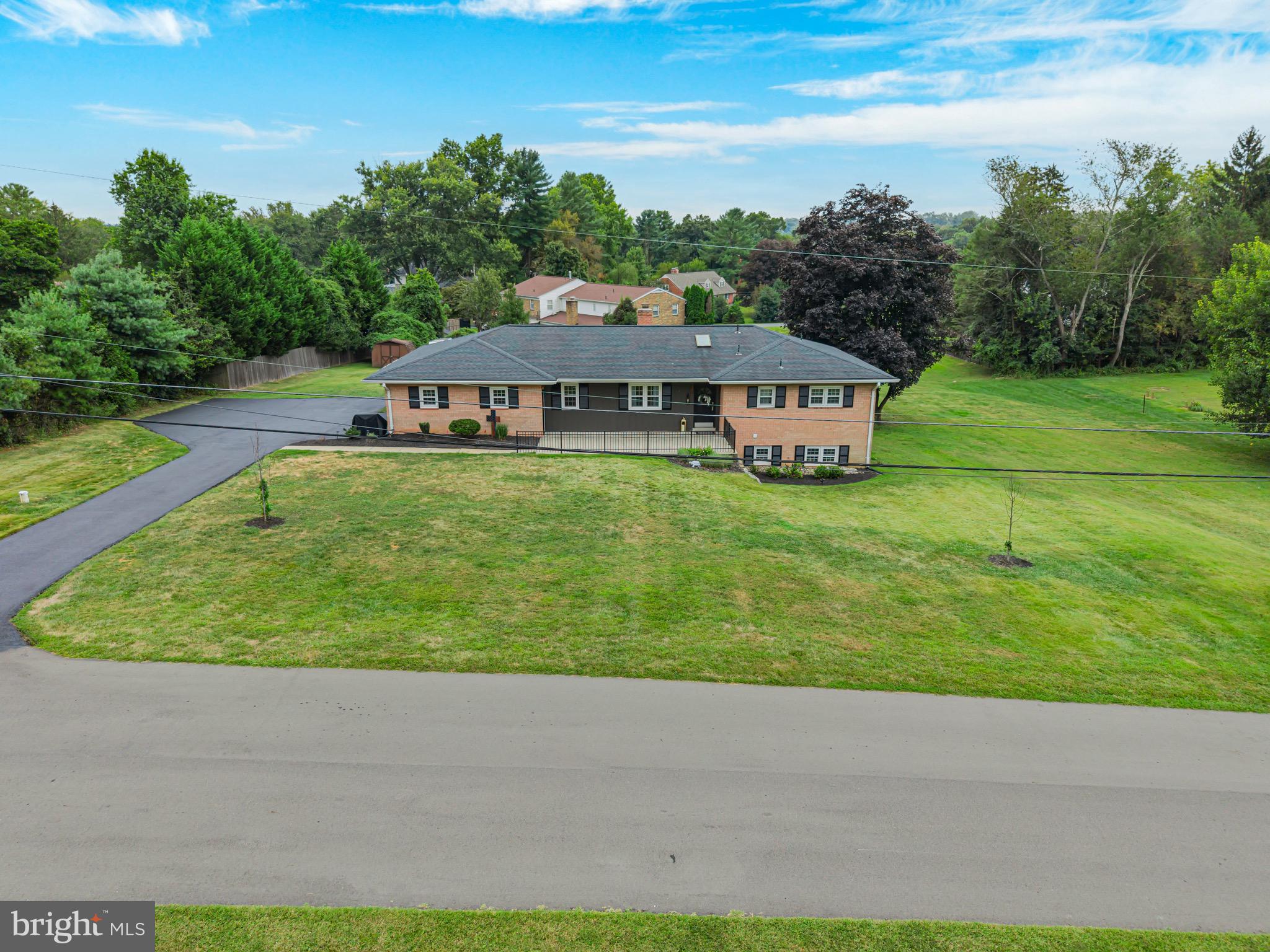 1716 Gayfields Drive Silver Spring, MD 20906 - Photo 2 of 55 a aerial view of a house next to a big yard and large trees