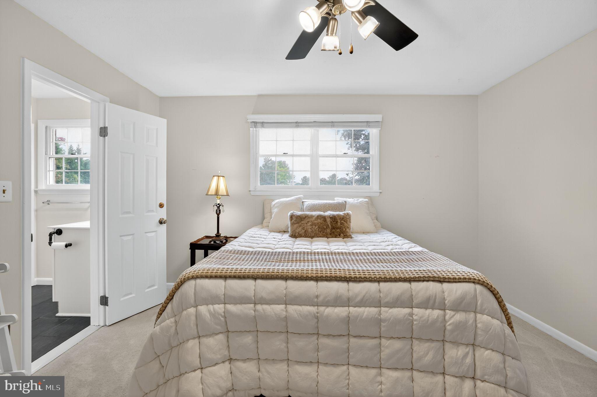 1716 Gayfields Drive Silver Spring, MD 20906 - Photo 35 of 55 a bedroom with a bed and window