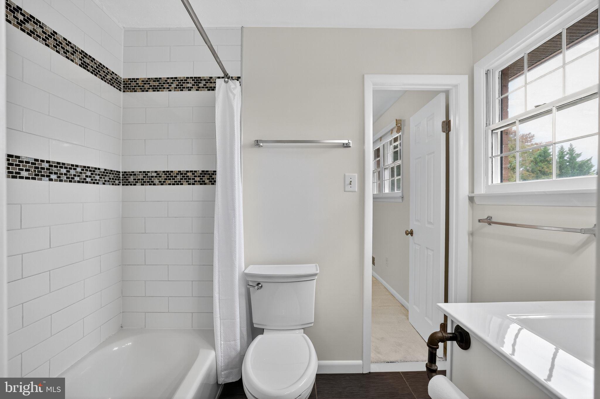 1716 Gayfields Drive Silver Spring, MD 20906 - Photo 40 of 55 a bathroom with a shower a toilet and a shower