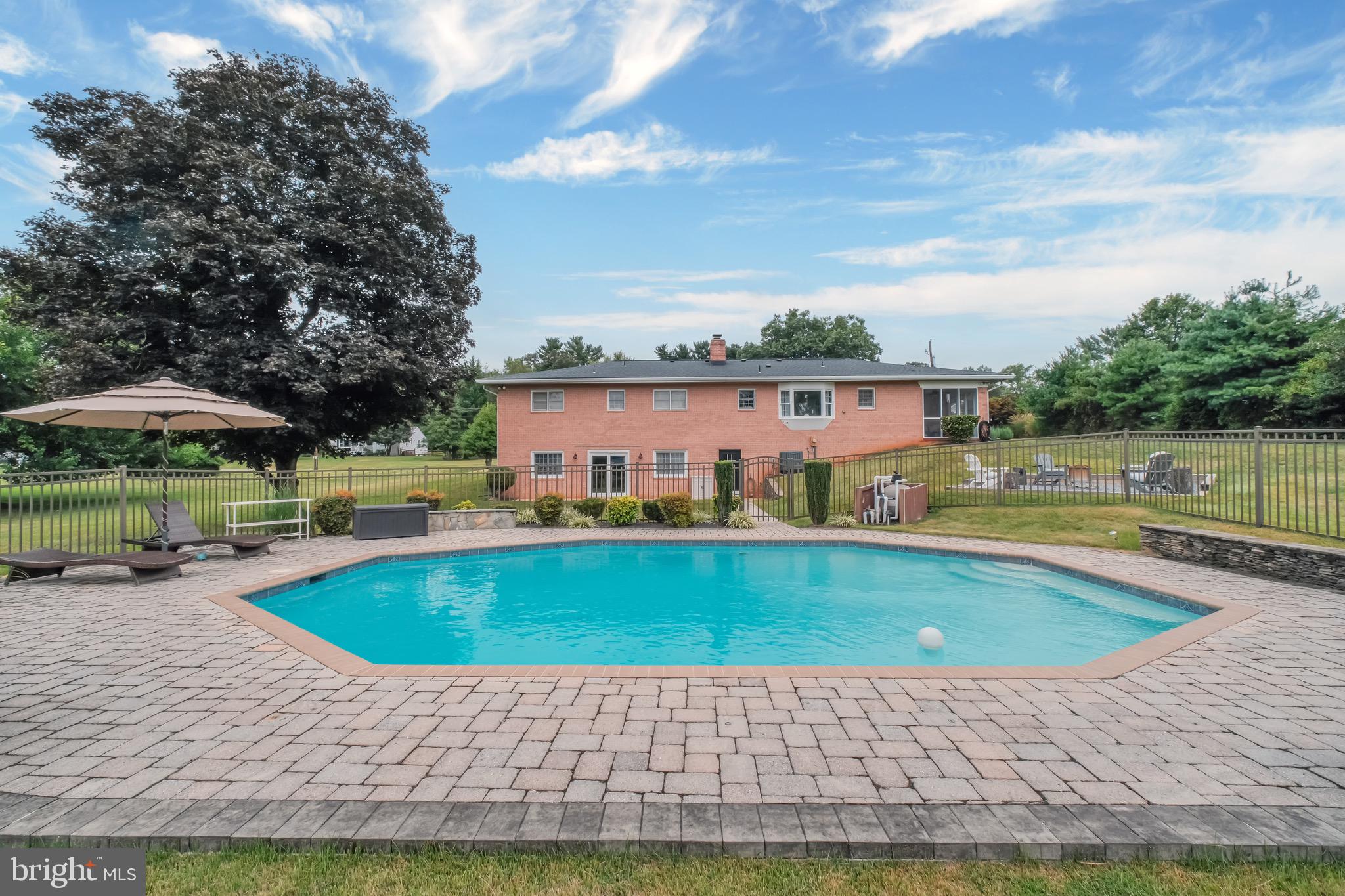 1716 Gayfields Drive Silver Spring, MD 20906 - Photo 4 of 55 a view of a swimming pool with a patio