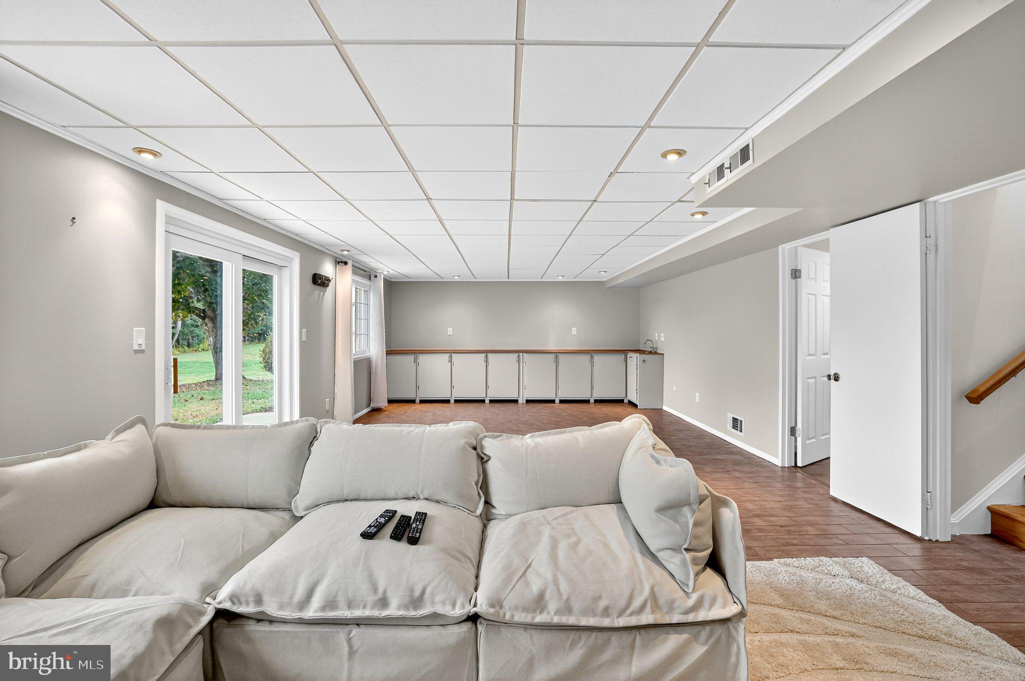 1716 Gayfields Drive Silver Spring, MD 20906 - Photo 46 of 55 a bed room with a bed and a couch