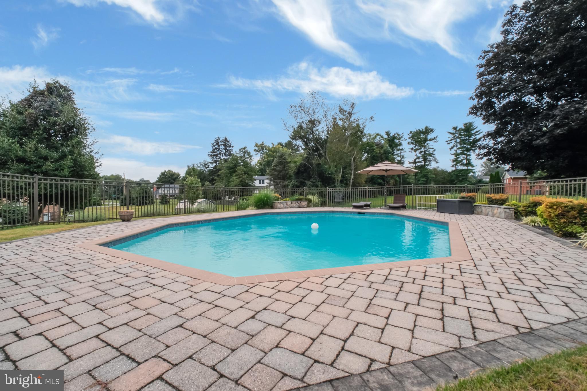 1716 Gayfields Drive Silver Spring, MD 20906 - Photo 5 of 55 a view of a swimming pool and a yard
