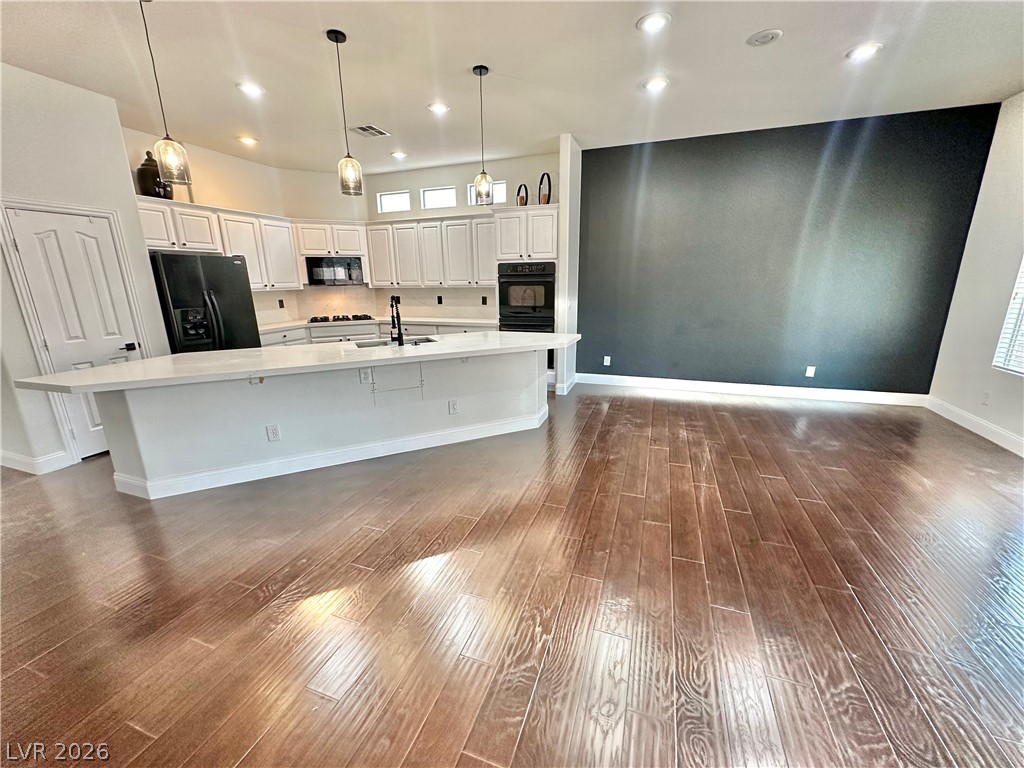 9996 Liberty View Road Las Vegas, NV 89148 - Photo 14 of 64 13 FOOT KITCHEN ISLAND AND ACCENT WALL