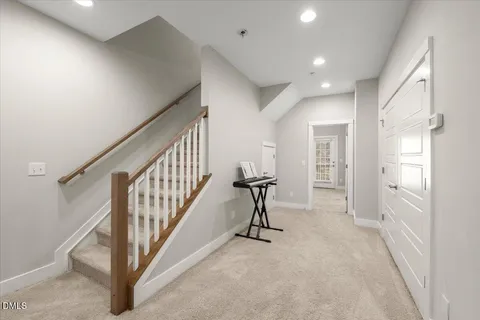 a view of a hallway with windows