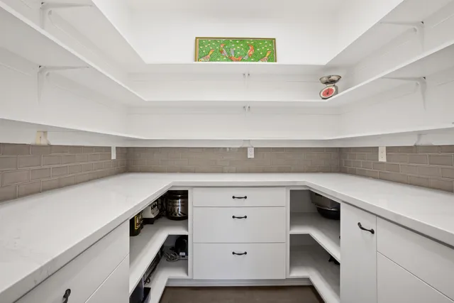 a kitchen with a cabinets and a dishwasher
