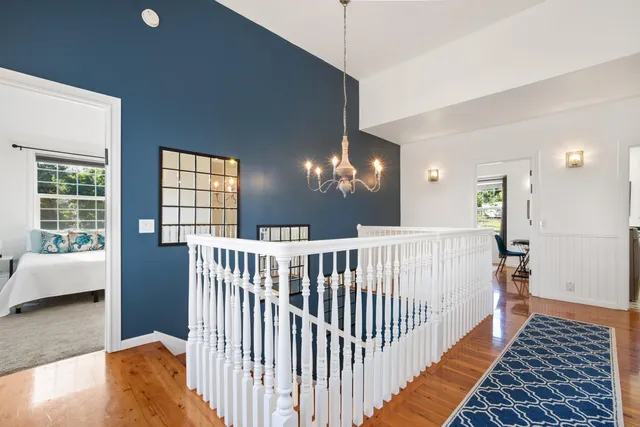 a view of a livingroom with furniture and windows