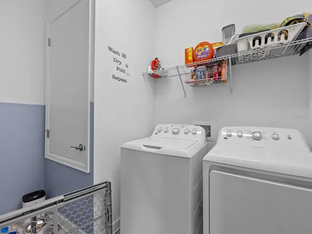 a balcony with furniture and a garden