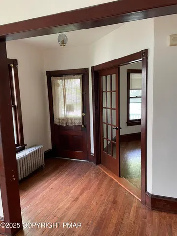 wooden floor and windows in a room