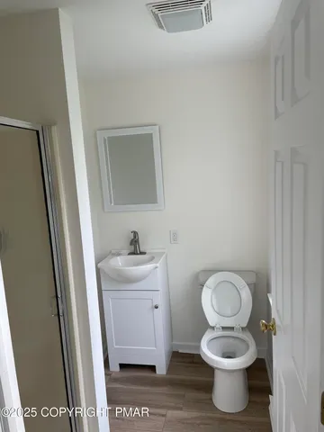 a bathroom with a sink and a toilet