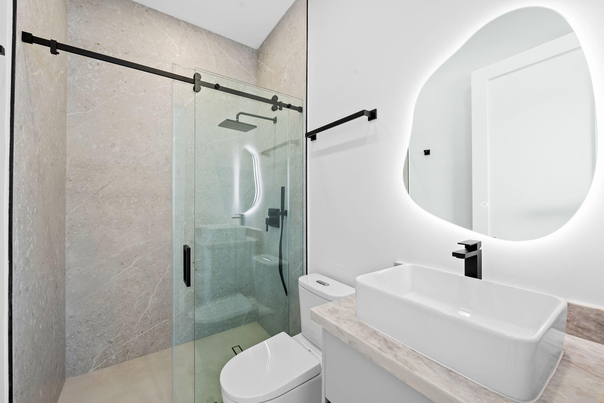 2324 Southwest 26th Street Miami, FL 33133 - Photo 11 of 45 a bathroom with a sink toilet and shower