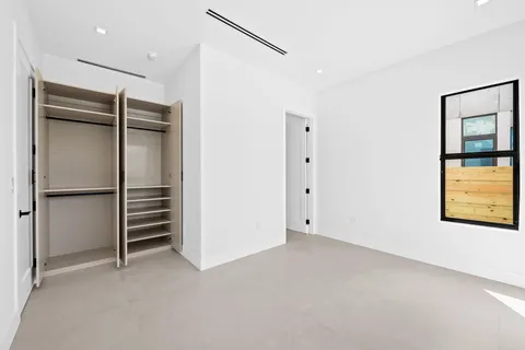 a bathroom with a toilet and a sink