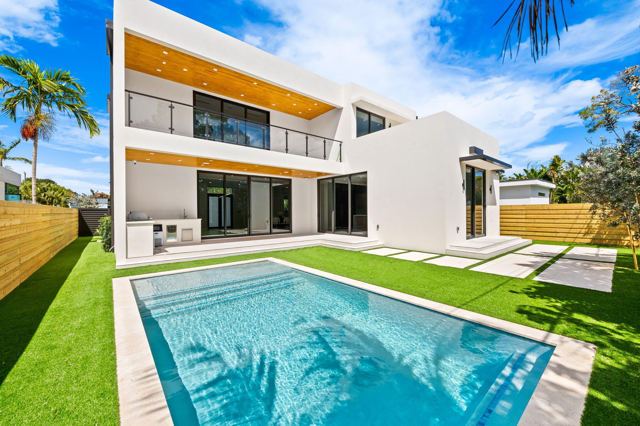 2324 Southwest 26th Street Miami, FL 33133 - Photo 35 of 45 a view of an house with swimming pool and porch
