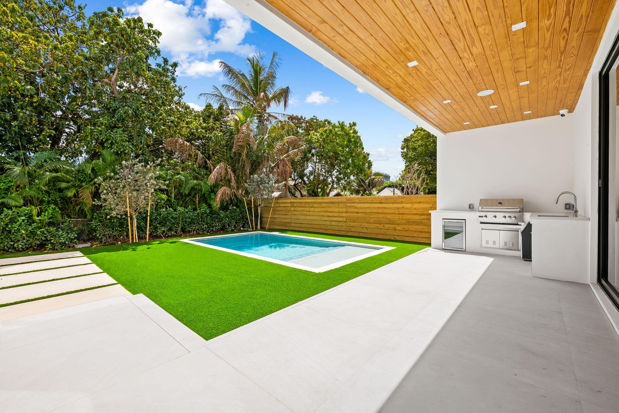 2324 Southwest 26th Street Miami, FL 33133 - Photo 38 of 45 a view of a backyard with swimming pool