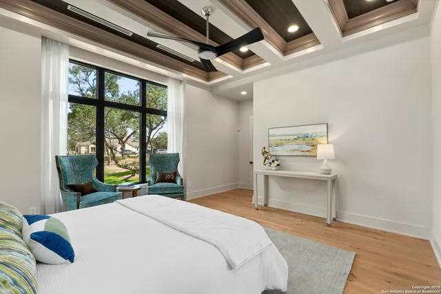 a bedroom with a bed and a table