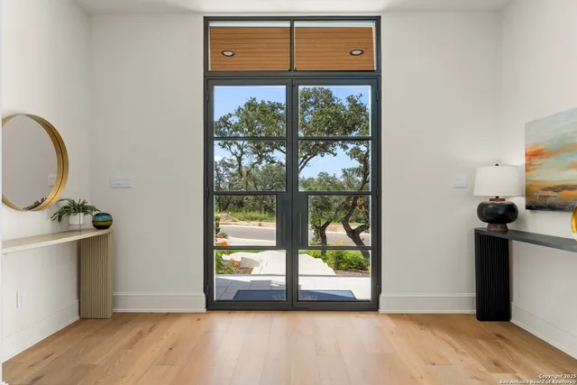 a view of a living room and a window