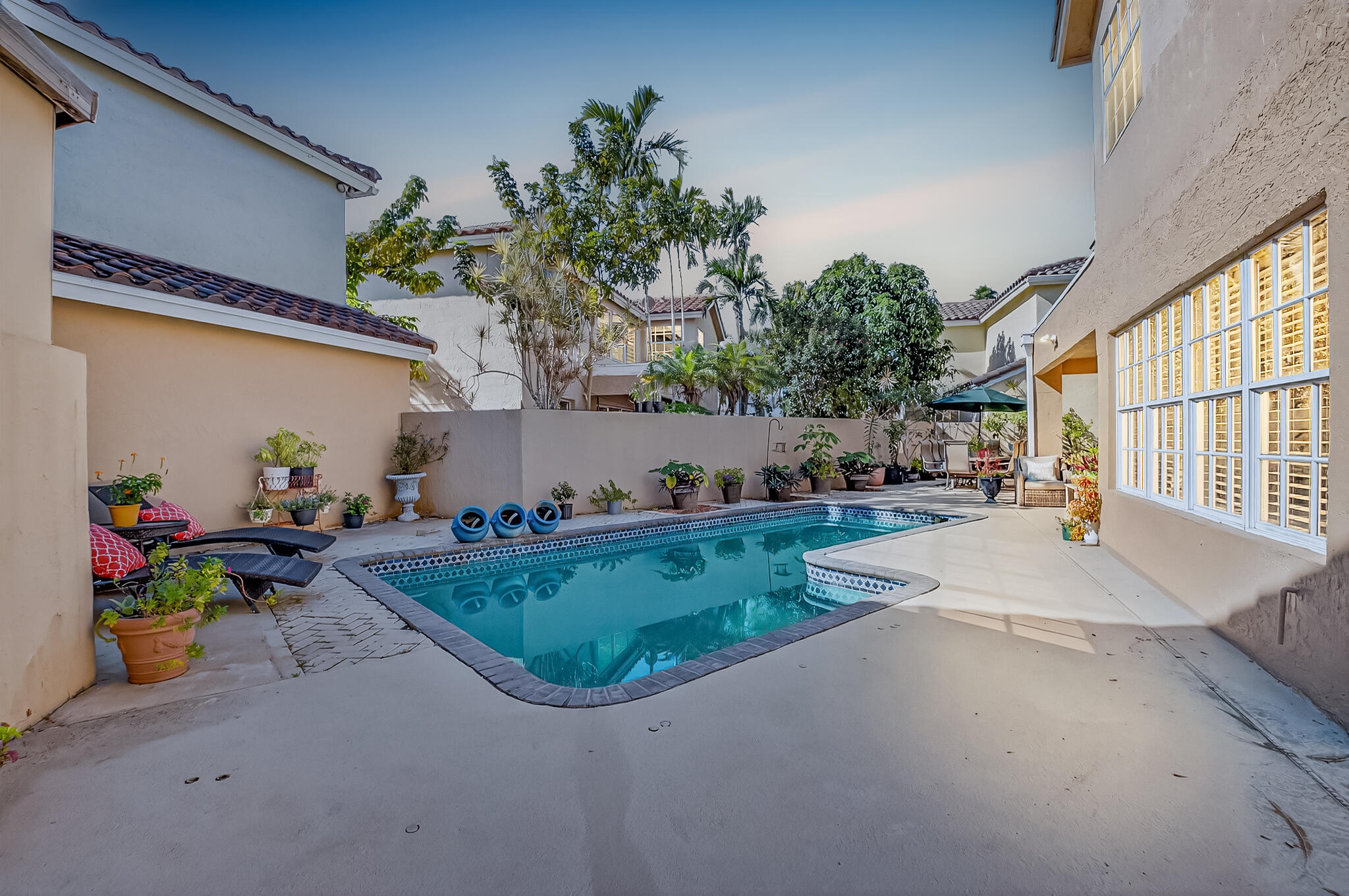 10570 Bexley Boulevard Boca Raton, FL 33428 - Photo 24 of 37 Backyard at Dusk