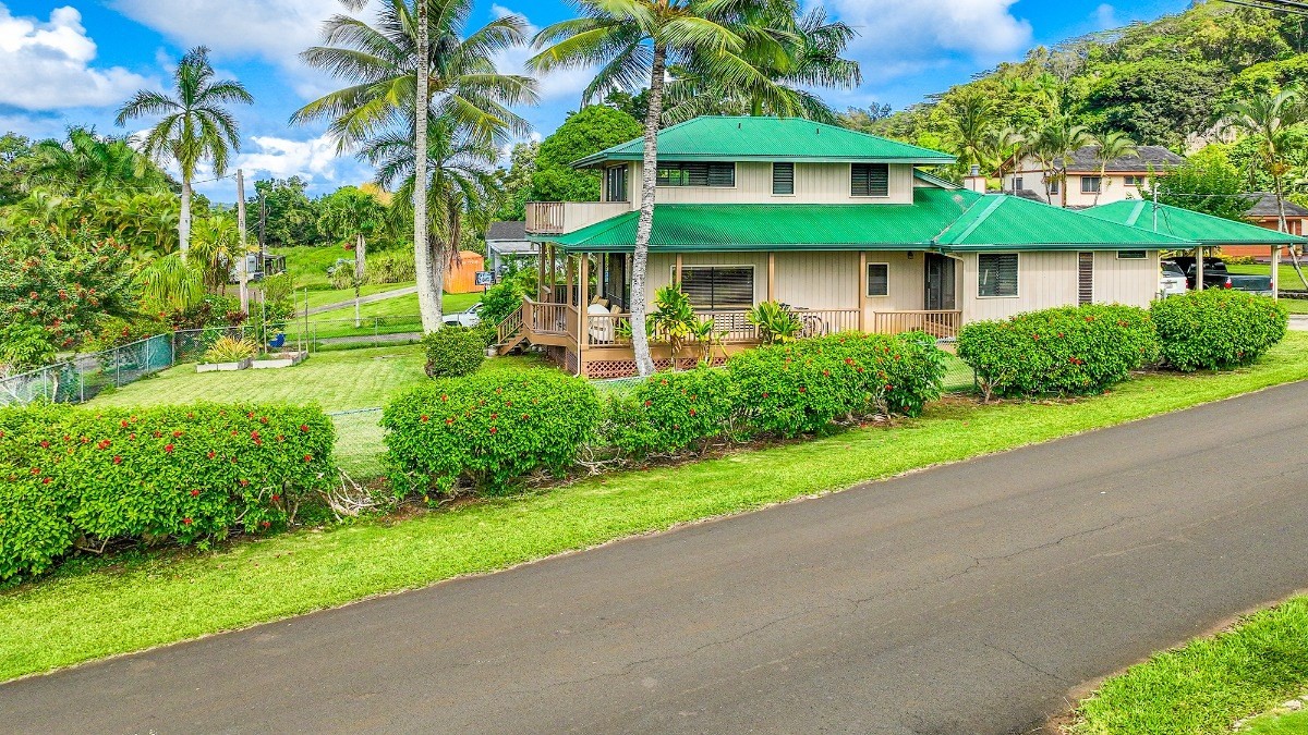 5890 Lokelani Road, Unit 2 Kapaa, HI 96746 - Photo 3 of 29 a view of a multi story building with a yard