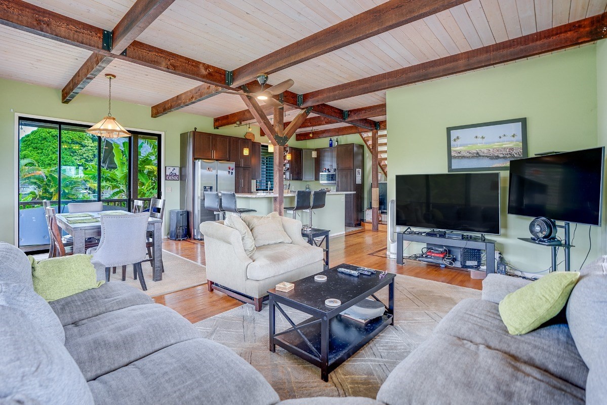 5890 Lokelani Road, Unit 2 Kapaa, HI 96746 - Photo 8 of 29 a outdoor living space with furniture and a flat screen tv