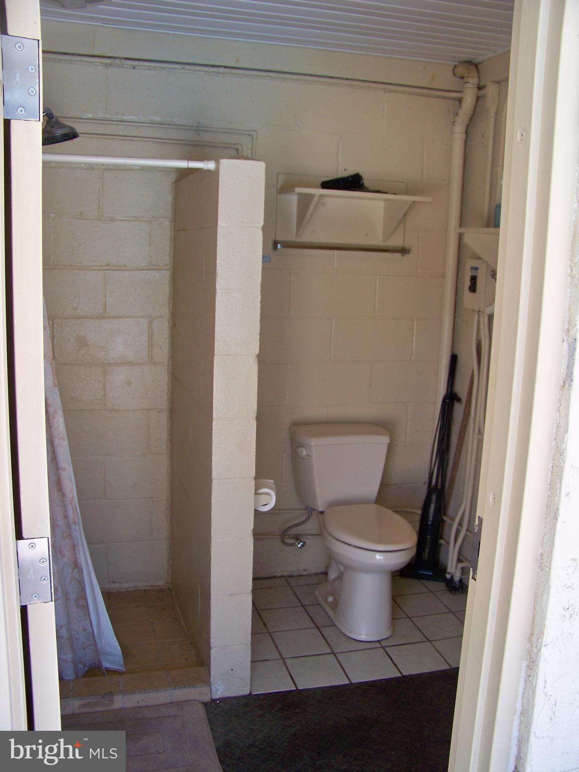 627 Truce Road New Providence, PA 17560 - Photo 10 of 32 Pool house w/ shower. toilet