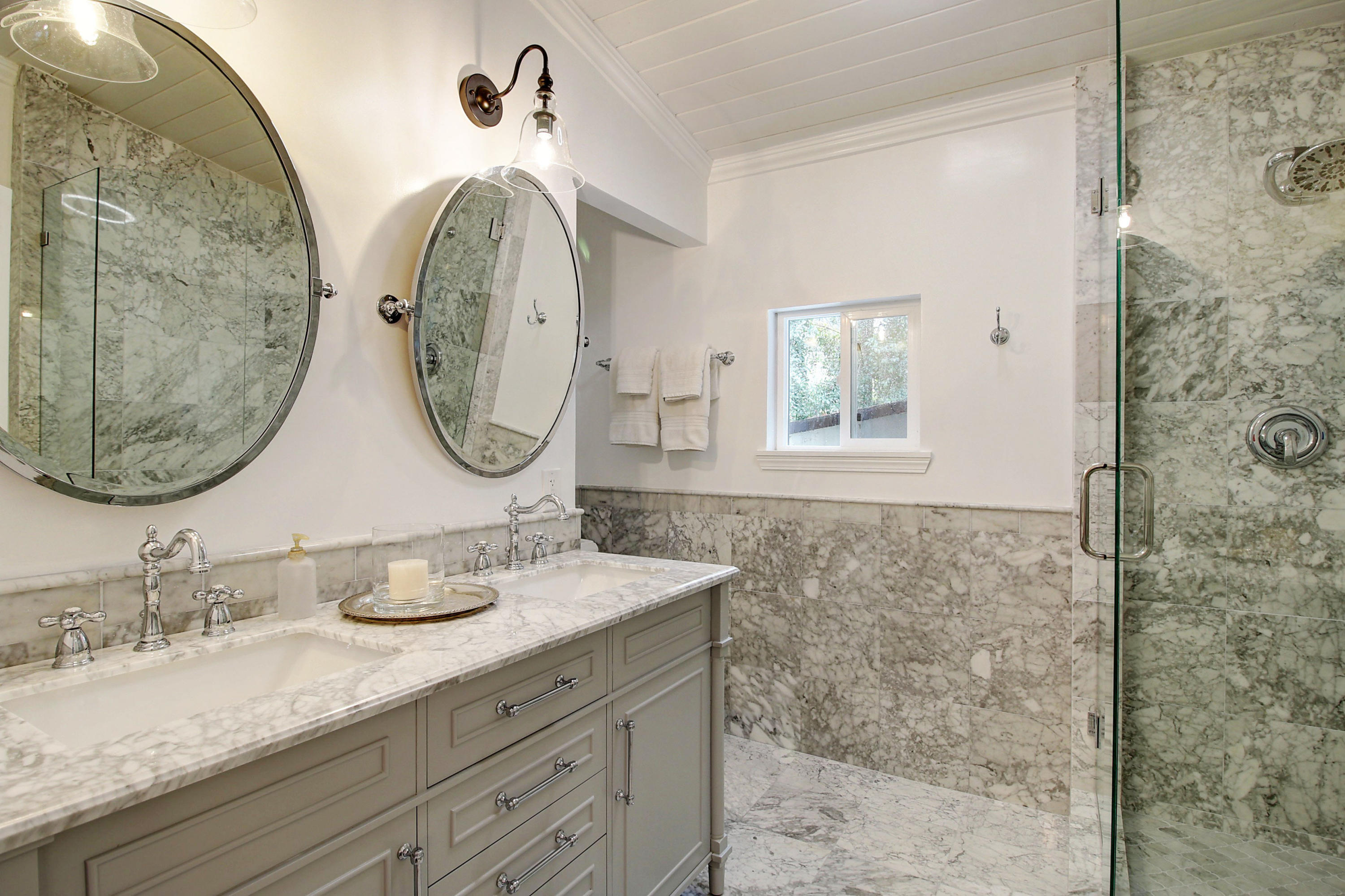 43 Humphrey Road Montecito, CA 93108 - Photo 11 of 17 a bathroom with double vanity sinks and a mirror