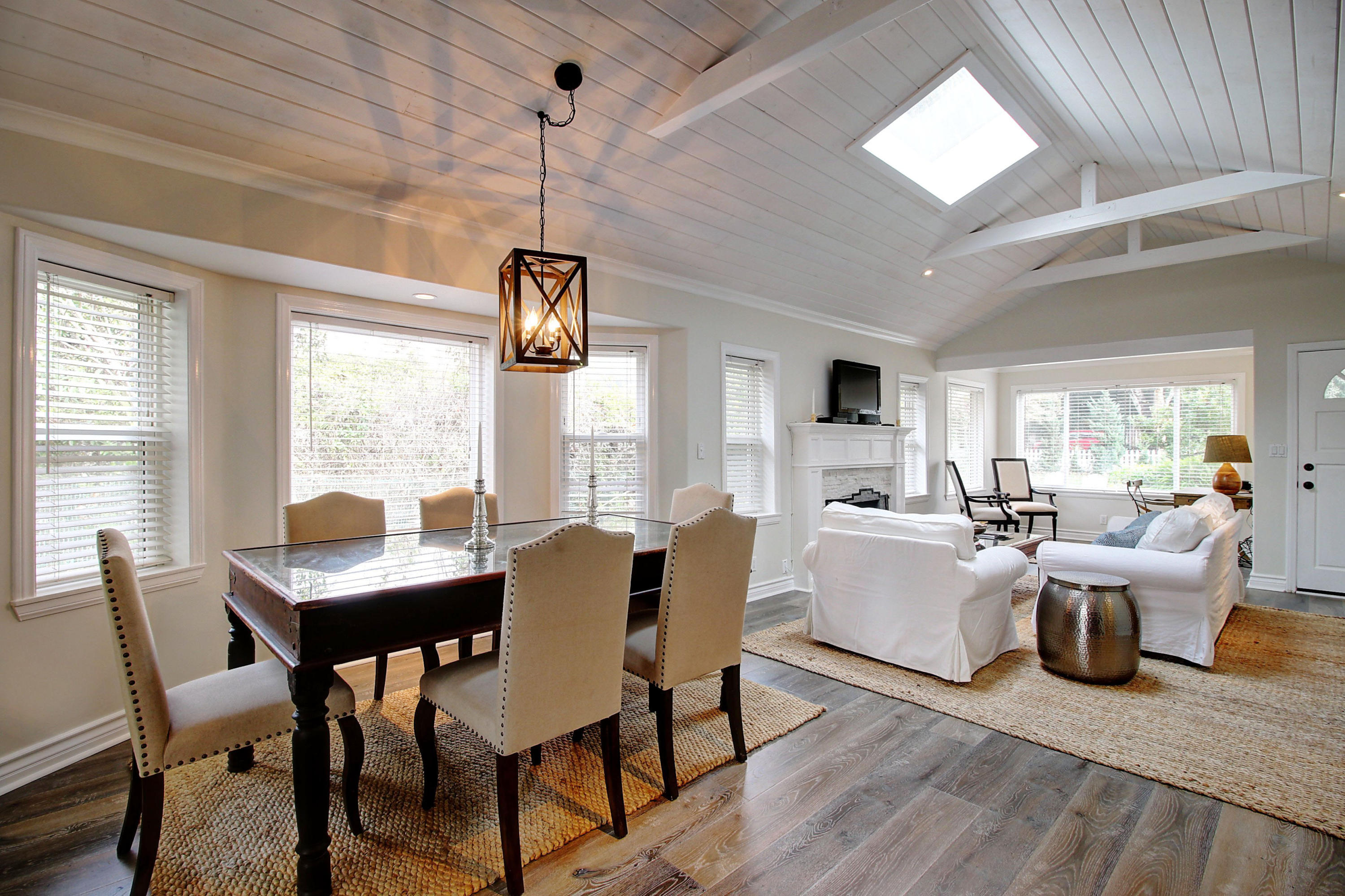 43 Humphrey Road Montecito, CA 93108 - Photo 6 of 17 a dining room with furniture a chandelier and wooden floor
