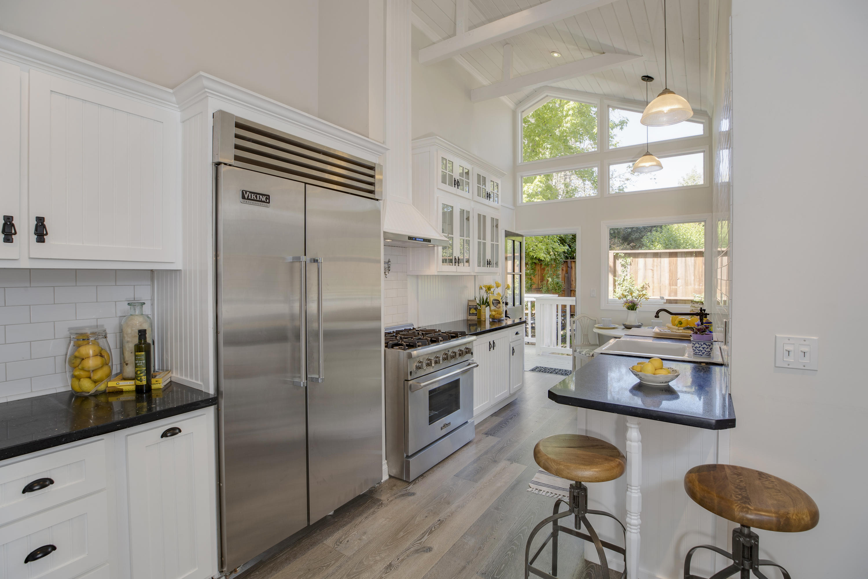 43 Humphrey Road Montecito, CA 93108 - Photo 9 of 17 a kitchen with cabinets and stainless steel appliances