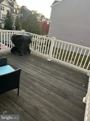 a view of balcony with furniture