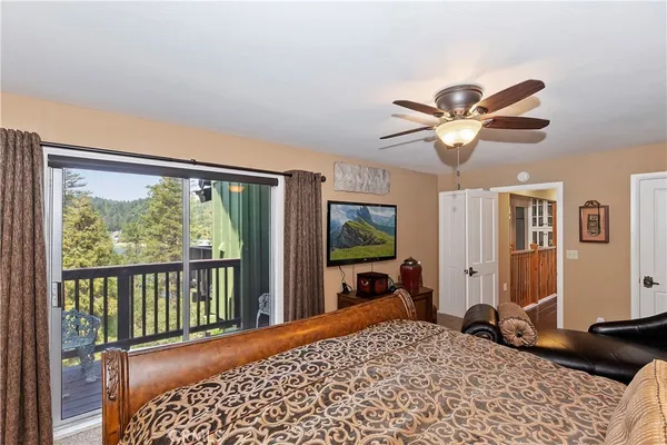 a bathroom with a bathtub and a window
