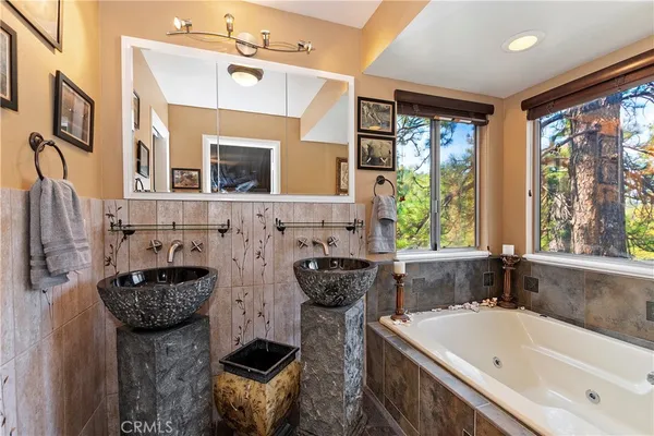a bathroom with a toilet and a shower curtain
