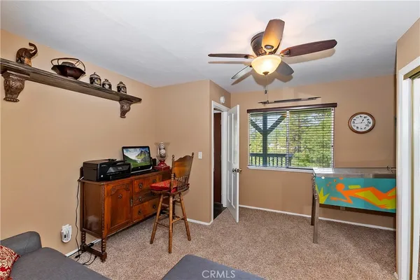 a view of balcony with wooden floor