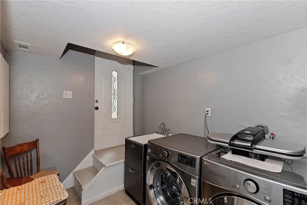 a view of a tree in a yard