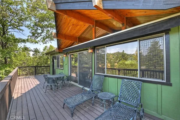 a view of a chairs on the roof deck