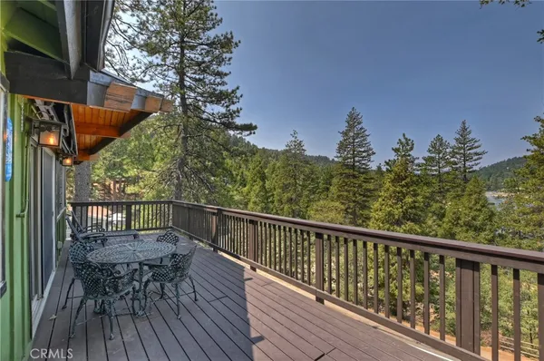 a front view of houses with yard