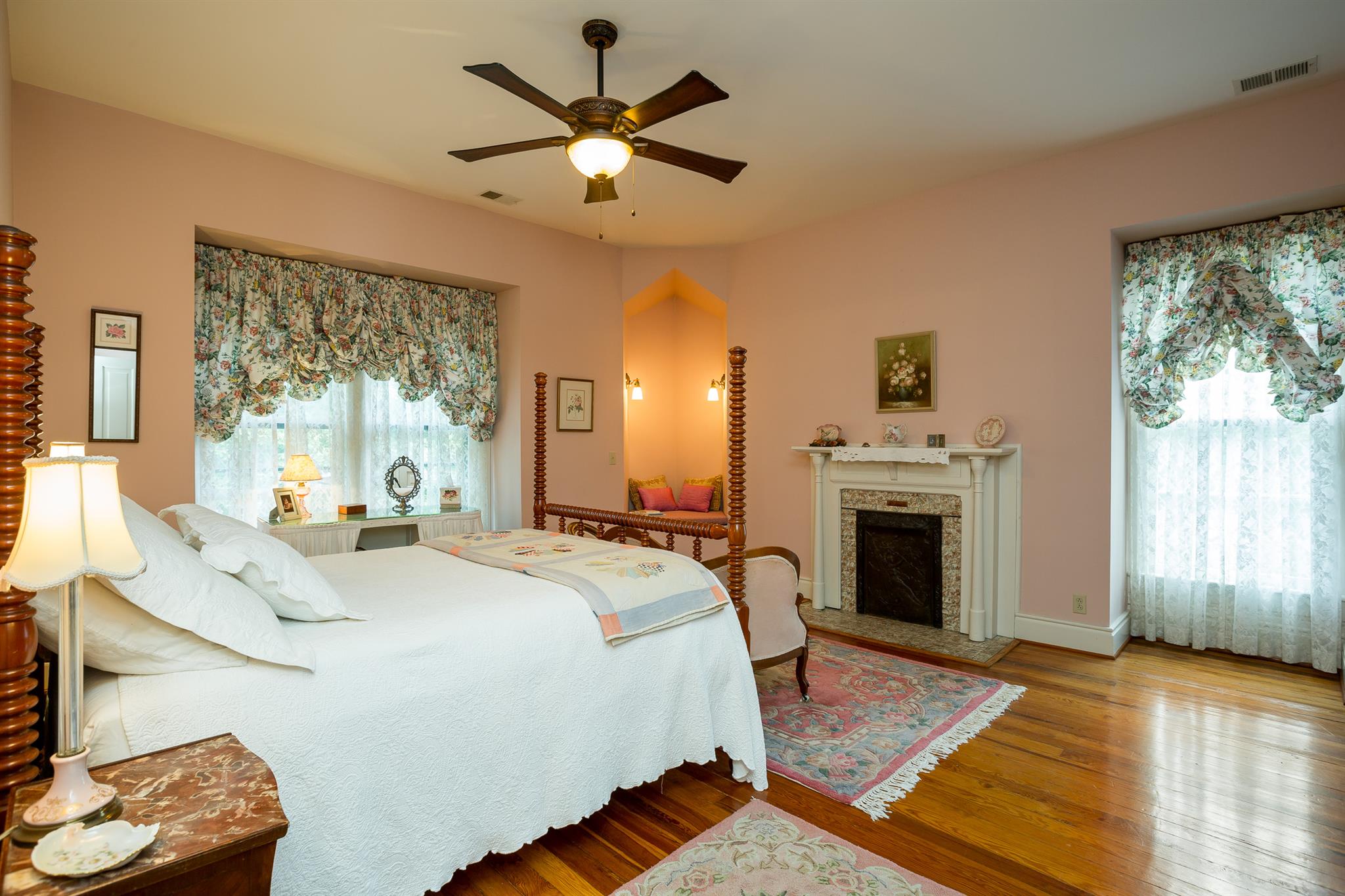317 North Garner Street Springfield, TN 37172 - Photo 26 of 30 a spacious bedroom with a bed and a fireplace
