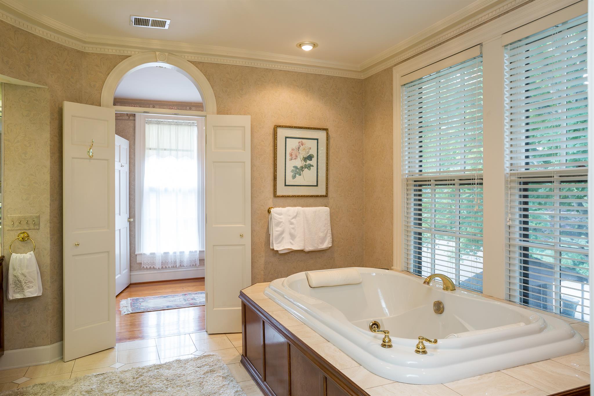 317 North Garner Street Springfield, TN 37172 - Photo 29 of 30 a bathroom with a tub and a sink